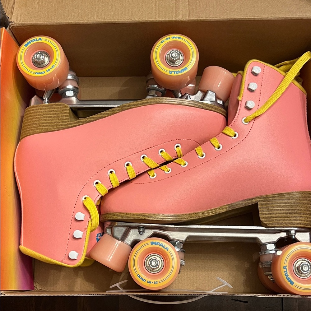 Impala Pink Roller Skates with Yellow Accents